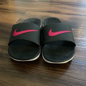 Black and Pink Nike Slides